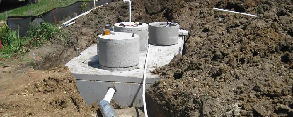 Septic system repair and installation site with tank access ports in Knoxville, TN