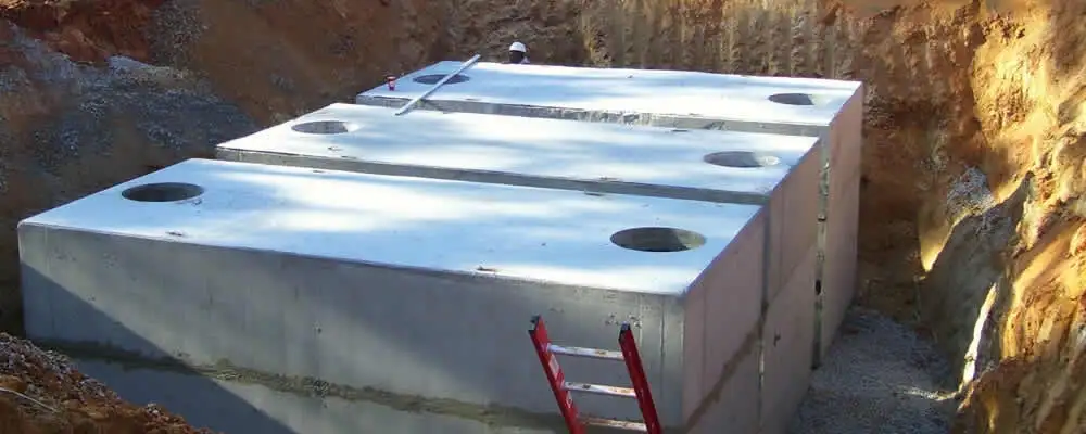 Septic tank installation site with a newly placed concrete tank in Knoxville, TN
